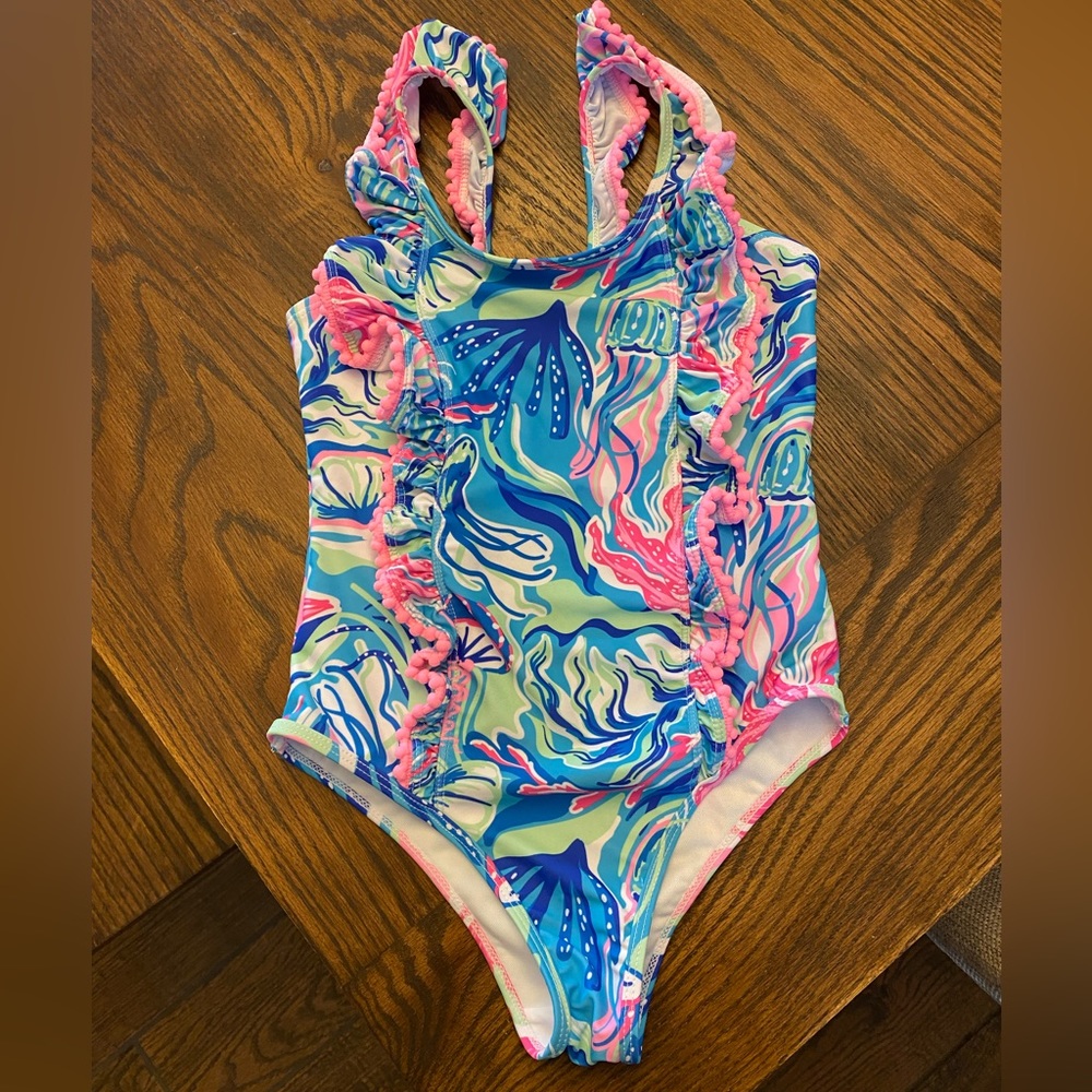 Girls swim suit. Tommy Bahama size 8. New, never worn, but the tags are off.